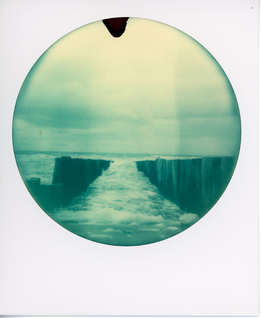 Polaroid passed expiration date, creating an interesting image of the Dutch shores of Zeeland (Province in the South-West of the Netherlands).
Number 125 of the project