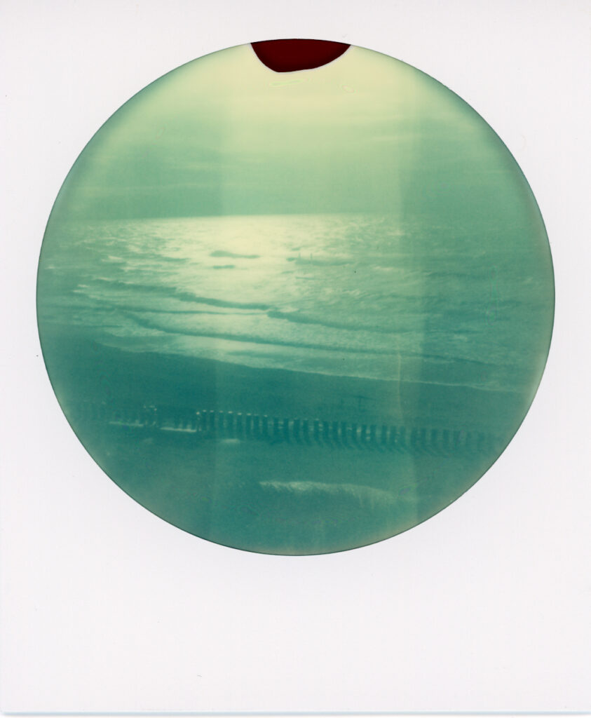 Polaroid passed expiration date, creating an interesting image of the Dutch shores of Zeeland (Province in the South-West of the Netherlands).
Number 129 of the project